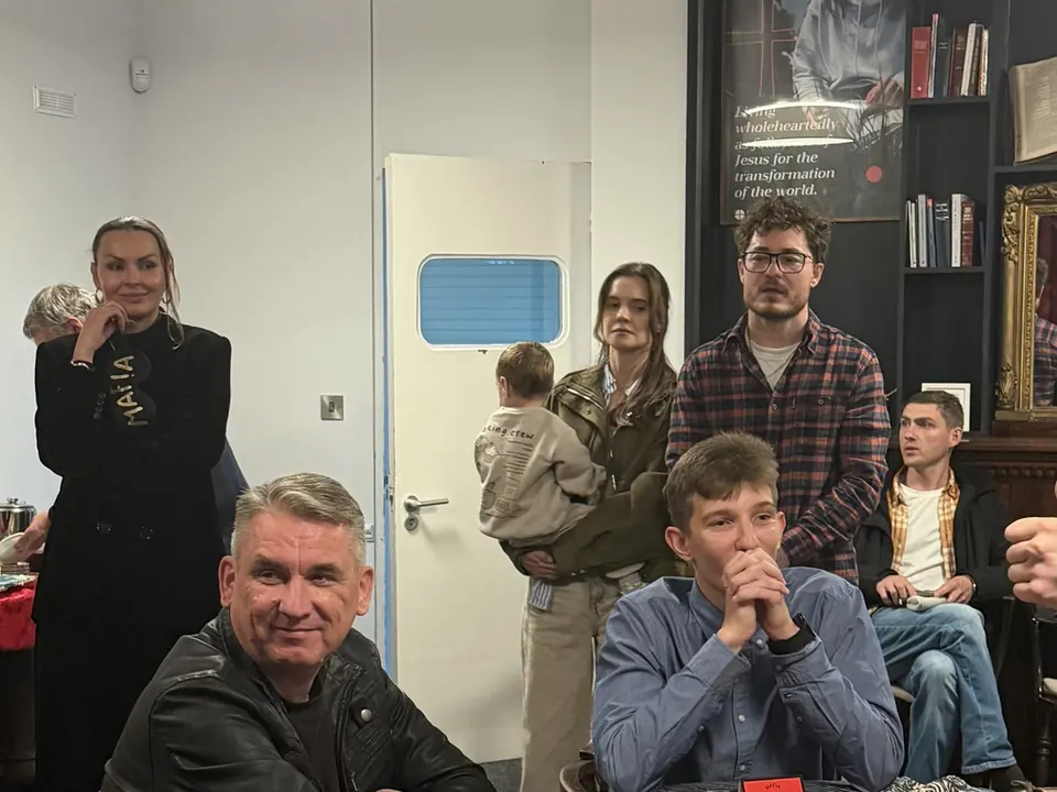 Club guests in the room, adults and a child among them