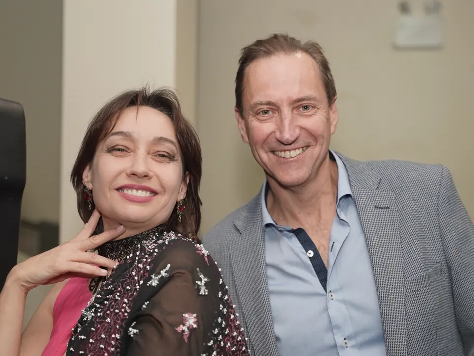 Two club guests pose for a photo