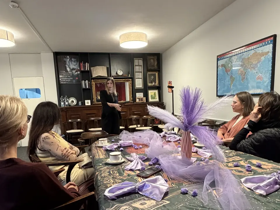 The club room and a table decorated for a themed evening